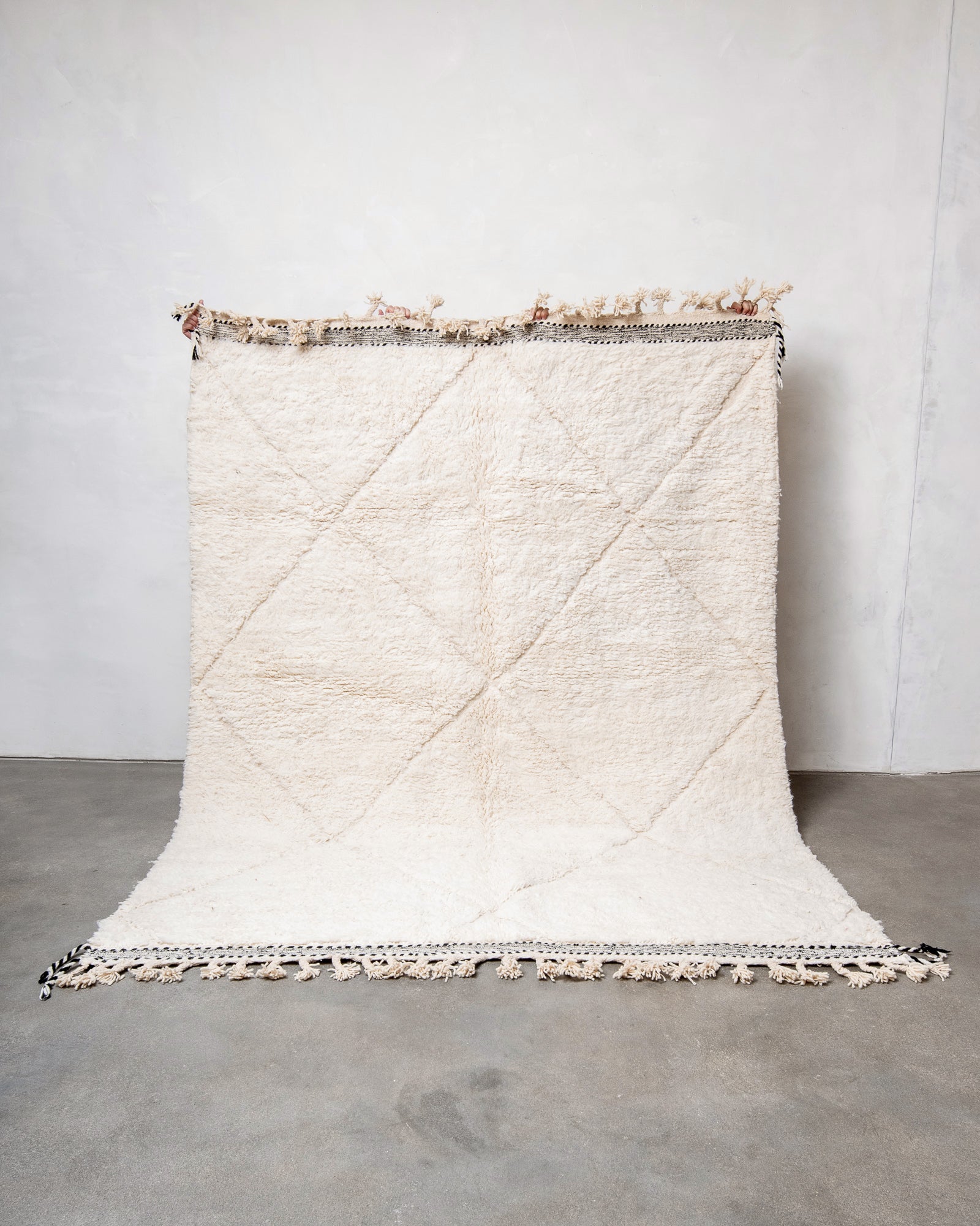Modern, designer, handcrafted Berber rug from Morocco. Beniourain carpet with beautiful colours and patterns and fluffy wool texture.